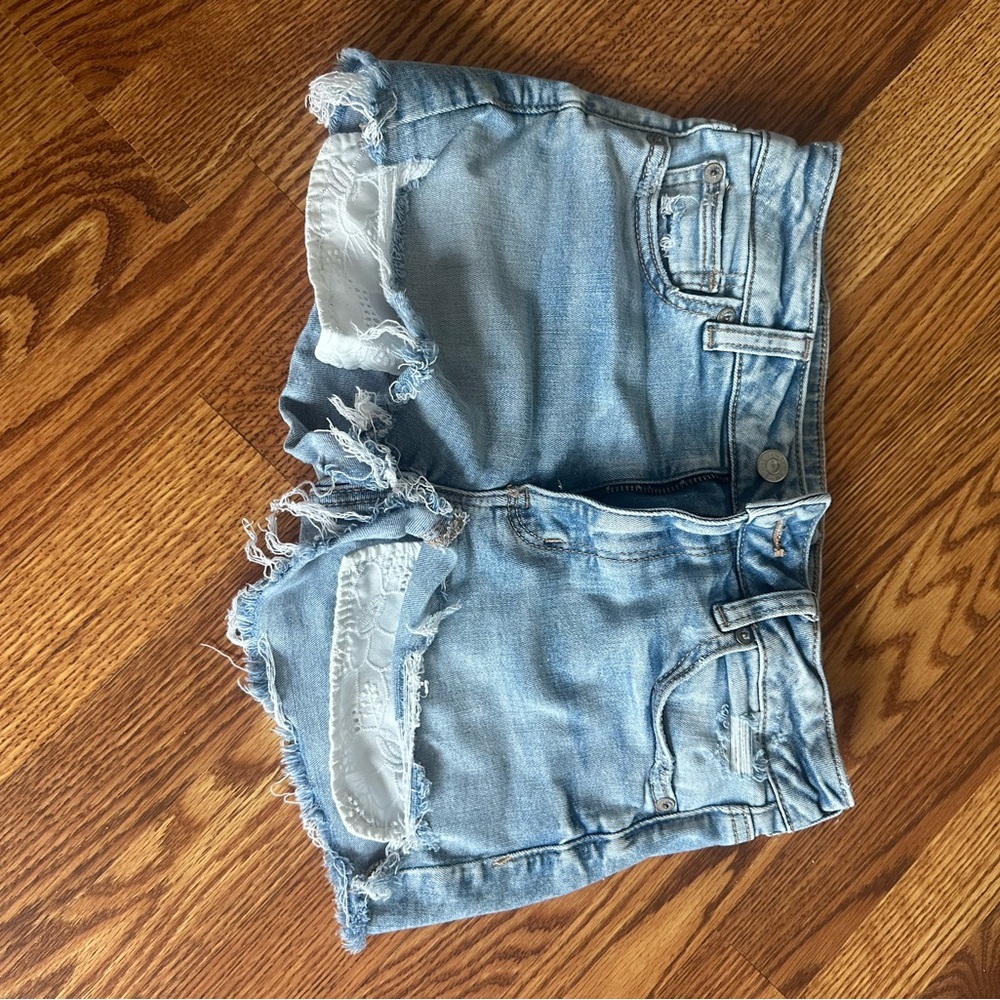 Distressed Light Blue Denim Shorts